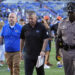 Florida head coach Billy Napier, center, walks off the field after his team was defeated by Miami, 41-17, in an NCAA college football game, Saturday, Aug. 31, 2024, in Gainesville, Fla. (AP Photo/John Raoux)