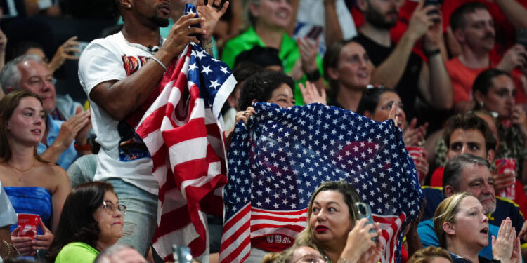 Jonathan Owens and Nellie Biles, husband and mother of USA's Simone Biles during the artistic gymnastics, women's team final, at Bercy Arena on the fourth day of the 2024 Paris Olympic Games in France. Picture date: Tuesday July 30, 2024. (Photo by Mike Egerton/PA Images via Getty Images)