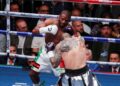 Floyd Mayweather Jr. and John Gotti III in action during their exhibition match, at the Arena CDMX, in Mexico City, Mexico, August 24, 2024. REUTERS/Henry Romero