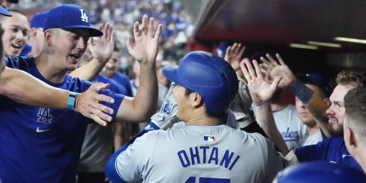 Los Angeles Dodgers designated hitter Shohei Ohtani, of Japan, celebrates his home run.