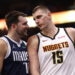 Luka Doncic #77 of the Dallas Mavericks and Nikola Jokic #15 of the Denver Nuggets