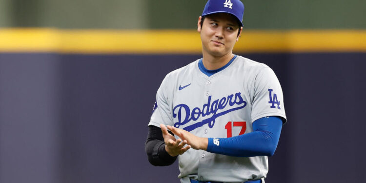 Shohei Ohtani is just the sixth player in MLB history to hit 40 home runs and record 40 stolen bases in a single season. (John Fisher/Getty Images)