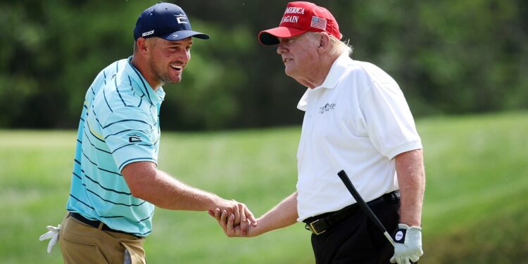 Bryson DeChambeau and Donald Trump shake hands