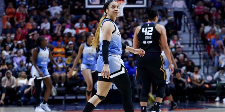 Chennedy Carter looks on during a game