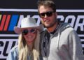 Kelly and Matthew Stafford at a NASCAR race