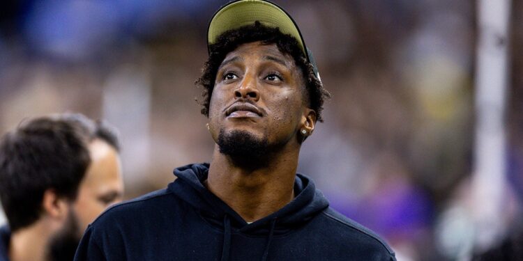 Michael Thomas on the sidelines before an NFL game