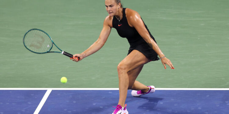 NEW YORK, NEW YORK - AUGUST 26: Aryna Sabalenka of Belarus returns against Priscilla Hon of Australia during their Women's Singles First Round match on Day One of the 2024 US Open at the USTA Billie Jean King National Tennis Center on August 26, 2024 in the Flushing neighborhood of the Queens borough of New York City. (Photo by Jamie Squire/Getty Images)