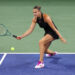 NEW YORK, NEW YORK - AUGUST 26: Aryna Sabalenka of Belarus returns against Priscilla Hon of Australia during their Women's Singles First Round match on Day One of the 2024 US Open at the USTA Billie Jean King National Tennis Center on August 26, 2024 in the Flushing neighborhood of the Queens borough of New York City. (Photo by Jamie Squire/Getty Images)