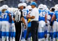 Jim Harbaugh talks with NFL ref