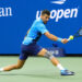 Aug 28, 2024; Flushing, NY, USA;  Novak Djokovic (SRB) hits to Laslo Djere (SRB) on day three of the 2024 U.S. Open tennis tournament at USTA Billie Jean King National Tennis Center. Mandatory Credit: Robert Deutsch-USA TODAY Sports