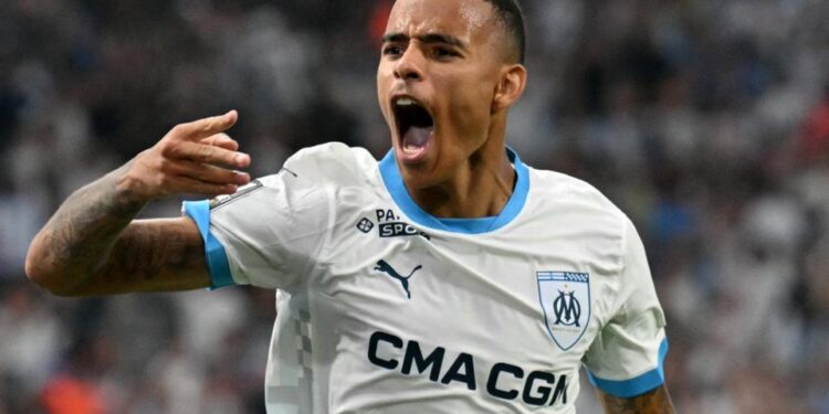 Mason Greenwood celebrates scoring for Marseille against Stade de Reim