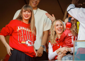 KANSAS CITY, MISSOURI - OCTOBER 22: Taylor Swift and Brittany Mahomes react during a game between the Los Angeles Chargers and Kansas City Chiefs at GEHA Field at Arrowhead Stadium on October 22, 2023 in Kansas City, Missouri. (Photo by David Eulitt/Getty Images)