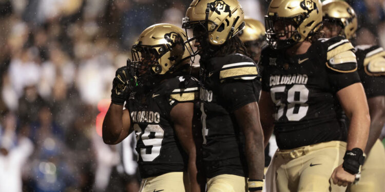 BOULDER, COLORADO - SEPTEMBER 21: Micah Welch #29 of the Colorado Buffaloes celebrates with teammates after scoring a touchdown during the fourth quarter against the Baylor Bears at Folsom Field on September 21, 2024 in Boulder, Colorado. (Photo by Andrew Wevers/Getty Images)