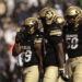 BOULDER, COLORADO - SEPTEMBER 21: Micah Welch #29 of the Colorado Buffaloes celebrates with teammates after scoring a touchdown during the fourth quarter against the Baylor Bears at Folsom Field on September 21, 2024 in Boulder, Colorado. (Photo by Andrew Wevers/Getty Images)