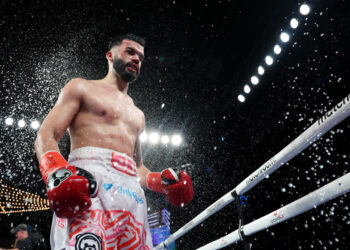 NEW YORK, NEW YORK - FEBRUARY 04:  John Bauza heads back to his corner between rounds against Richardson Hitchins during their Super Lightweight fight  at The Hulu Theater at Madison Square Garden on February 04, 2023 in New York City. (Photo by Al Bello/Getty Images)