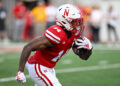 LINCOLN, NEBRASKA - SEPTEMBER 16: Running back Rahmir Johnson #14 of the Nebraska Cornhuskers returns a kickoff against the Northern Illinois Huskies in the first quarter at Memorial Stadium on September 16, 2023 in Lincoln, Nebraska. (Photo by Steven Branscombe/Getty Images)