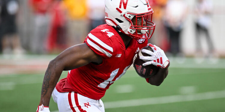 LINCOLN, NEBRASKA - SEPTEMBER 16: Running back Rahmir Johnson #14 of the Nebraska Cornhuskers returns a kickoff against the Northern Illinois Huskies in the first quarter at Memorial Stadium on September 16, 2023 in Lincoln, Nebraska. (Photo by Steven Branscombe/Getty Images)