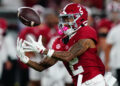 Sep 28, 2024; Tuscaloosa, Alabama, USA;  Alabama Crimson Tide wide receiver Ryan Williams (2) reaches for a pass against the Georgia Bulldogs during the third quarter at Bryant-Denny Stadium. Mandatory Credit: John David Mercer-Imagn Images