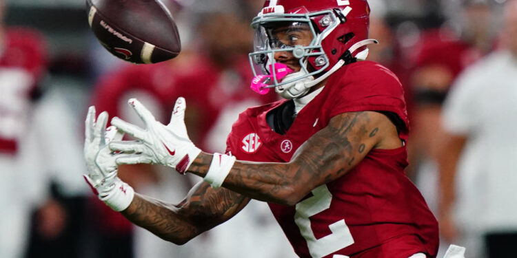 Sep 28, 2024; Tuscaloosa, Alabama, USA;  Alabama Crimson Tide wide receiver Ryan Williams (2) reaches for a pass against the Georgia Bulldogs during the third quarter at Bryant-Denny Stadium. Mandatory Credit: John David Mercer-Imagn Images