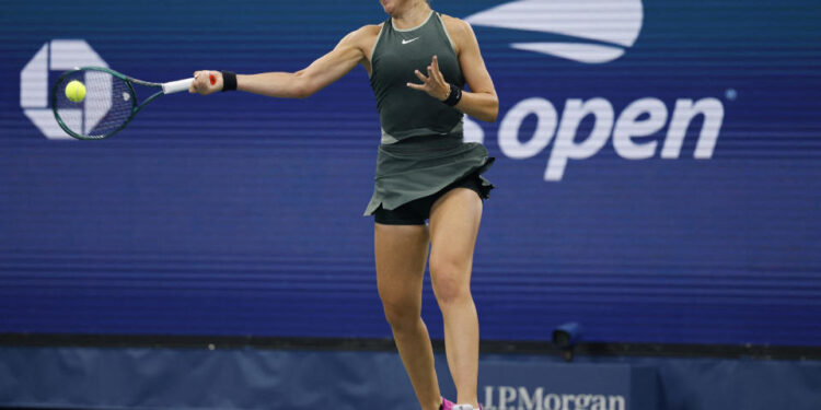 Sep 1, 2024; Flushing, NY, USA; Paula Badosa (ESP) hits a forehand against Yafan Wang (CHN) (not pictured) in a women's singles match on day seven of the 2024 U.S. Open tennis tournament at USTA Billie Jean King National Tennis Center. Mandatory Credit: Geoff Burke-USA TODAY Sports