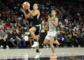 LAS VEGAS, NEVADA - SEPTEMBER 24: Kelsey Plum #10 of the Las Vegas Aces drives to the basket ahead of Skylar Diggins-Smith #4 of the Seattle Storm in the third quarter of Game Two of the 2024 WNBA Playoffs first round at Michelob ULTRA Arena on September 24, 2024 in Las Vegas, Nevada. The Aces defeated the Storm 83-76 to win the series two games to none. NOTE TO USER: User expressly acknowledges and agrees that, by downloading and or using this photograph, User is consenting to the terms and conditions of the Getty Images License Agreement. (Photo by Ethan Miller/Getty Images)