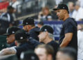 Chicago, Illinois, USA; Chicago White Sox interim manager Grady Sizemore (24) looks on from the dugout during the first inning of a baseball game against the Oakland Athletics at Guaranteed Rate Field. Mandatory Credit: Kamil Krzaczynski-Imagn Images