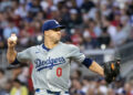 Sep 14, 2024; Cumberland, Georgia, USA; Los Angeles Dodgers pitcher Jack Flaherty (0) pitches the ball against the Atlanta Braves during the first inning at Truist Park. Mandatory Credit: Jordan Godfree-Imagn Images