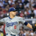 Sep 14, 2024; Cumberland, Georgia, USA; Los Angeles Dodgers pitcher Jack Flaherty (0) pitches the ball against the Atlanta Braves during the first inning at Truist Park. Mandatory Credit: Jordan Godfree-Imagn Images