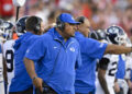 Sep 6, 2024; Dallas, Texas, USA; BYU Cougars coach Kalani Sitake looks on during the first half of the game against SMU at Gerald J. Ford Stadium. Mandatory Credit: Jerome Miron-Imagn Images