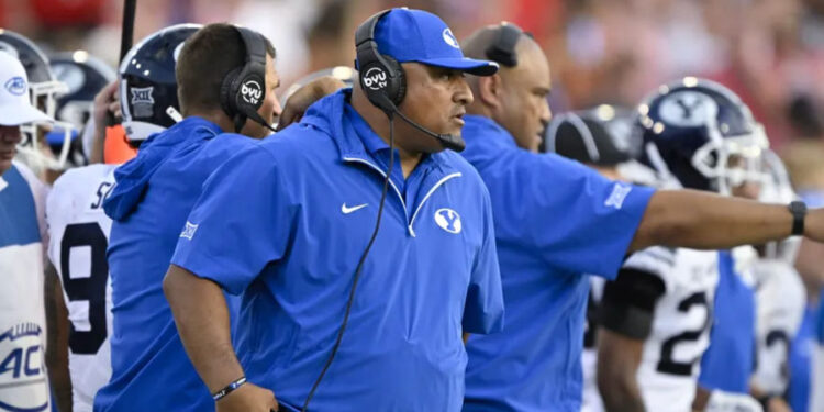 Sep 6, 2024; Dallas, Texas, USA; BYU Cougars coach Kalani Sitake looks on during the first half of the game against SMU at Gerald J. Ford Stadium. Mandatory Credit: Jerome Miron-Imagn Images