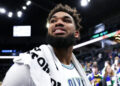 Feb 24, 2024; Minneapolis, Minnesota, USA; Minnesota Timberwolves center Karl-Anthony Towns (32) reacts to the team s win against the Brooklyn Nets after the game at Target Center. credits: Matt Krohn-USA TODAY Sports