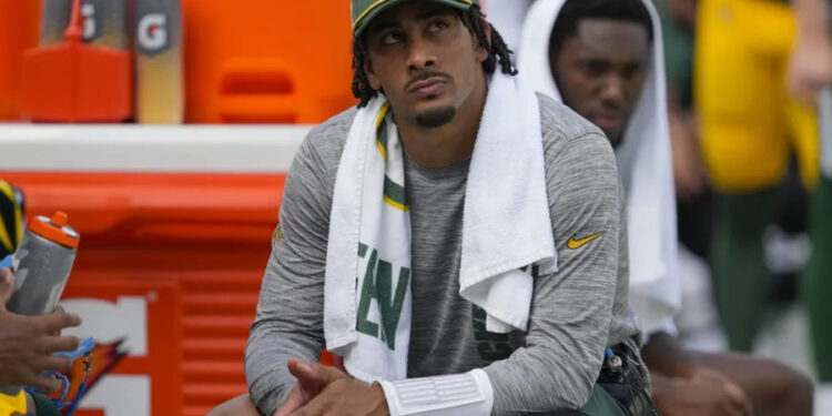 Sep 15, 2024; Green Bay, Wisconsin, USA; Green Bay Packers quarterback Jordan Love looks on from the sidelines during the fourth quarter against the Indianapolis Colts at Lambeau Field. Mandatory Credit: Jeff Hanisch-Imagn Images