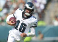 PHILADELPHIA, PENNSYLVANIA - AUGUST 24: Tanner McKee #16 of the Philadelphia Eagles runs the ball against the Minnesota Vikings during the preseason game at Lincoln Financial Field on August 24, 2024 in Philadelphia, Pennsylvania. The Vikings defeated the Eagles 26-3. (Photo by Mitchell Leff/Getty Images)