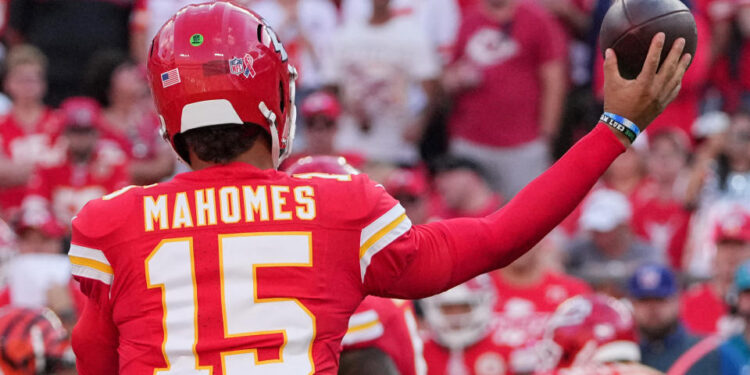 Sep 15, 2024; Kansas City, Missouri, USA; Kansas City Chiefs quarterback Patrick Mahomes (15) throws a pass against the Cincinnati Bengals during the game at GEHA Field at Arrowhead Stadium. Mandatory Credit: Denny Medley-Imagn Images