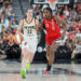 LAS VEGAS, NEVADA - JULY 02: Caitlin Clark #22 of the Indiana Fever brings the ball up the court against Jackie Young #0 of the Las Vegas Aces in the second quarter of their game at T-Mobile Arena on July 02, 2024 in Las Vegas, Nevada. The Aces defeated the Fever 88-69. NOTE TO USER: User expressly acknowledges and agrees that, by downloading and or using this photograph, User is consenting to the terms and conditions of the Getty Images License Agreement. (Photo by Ethan Miller/Getty Images)