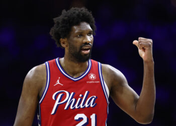 PHILADELPHIA, PENNSYLVANIA - APRIL 28: Joel Embiid #21 of the Philadelphia 76ers reacts during the fourth quarter against the New York Knicks during game four of the Eastern Conference First Round Playoffs at the Wells Fargo Center on April 28, 2024 in Philadelphia, Pennsylvania. (Photo by Tim Nwachukwu/Getty Images)