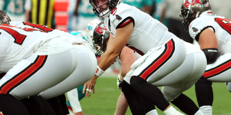 Aug 23, 2024; Tampa, Florida, USA;  Tampa Bay Buccaneer quarterback Baker Mayfield (6) calls a play against the Miami Dolphins during the first quarter at Raymond James Stadium. Mandatory Credit: Kim Klement Neitzel-USA TODAY Sports