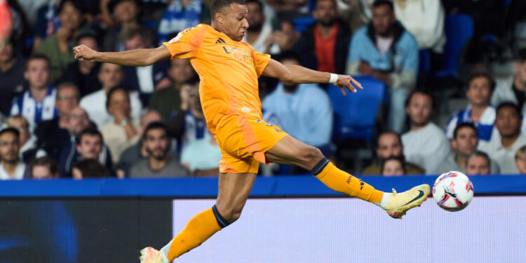 SAN SEBASTIAN, SPAIN - SEPTEMBER 14: Kylian Mbappe of Real Madrid in action during the LaLiga match between Real Sociedad and Real Madrid CF  at Reale Arena on September 14, 2024 in San Sebastian, Spain. (Photo by Juan Manuel Serrano Arce/Getty Images)