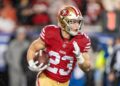 January 20, 2024; Santa Clara, CA, USA; San Francisco 49ers running back Christian McCaffrey (23) runs the ball against the Green Bay Packers during the first quarter in a 2024 NFC divisional round game at Levi's Stadium. Mandatory Credit: Kyle Terada-USA TODAY Sports