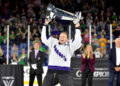 LOWELL, MASSACHUSETTS - MAY 29: Kendall Coyne Schofield #26 of Minnesota raises The Walter Cup after Minnesota defeated Boston at Tsongas Center on May 29, 2024 in Lowell, Massachusetts. (Photo by Troy Parla/Getty Images)