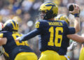 ANN ARBOR, MI - SEPTEMBER 14:  Michigan Wolverines quarterback Davis Warren (16) throws a pass during the first quarter of a non-conference college football game between the Arkansas State Red Wolves and the Michigan Wolverines on September 14, 2024 at Michigan Stadium in Ann Arbor, Michigan.  (Photo by Scott W. Grau/Icon Sportswire via Getty Images)