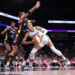 PHOENIX, ARIZONA - AUGUST 28: Kayla McBride #21 of the Minnesota Lynx drives into Natasha Cloud #0 of the Phoenix Mercury during the first half at Footprint Center on August 28, 2024 in Phoenix, Arizona.The Lynx defeated the Mercury 89-76.  NOTE TO USER: User expressly acknowledges and agrees that, by downloading and or using this photograph, User is consenting to the terms and conditions of the Getty Images License Agreement.  (Photo by Chris Coduto/Getty Images)