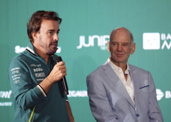 Fernando Alonso, left, speaks during a press conference to unveil Adrian Newey, right, as the newly appointed managing technical partner of Aston Martin Aramco Formula One Team, at the AMF1 Team Technology Campus, Silverstone, Northamptonshire, England, Tuesday Sept. 10, 2024. Adrian Newey said it is his goal to turn Aston Martin into Formula One world champions after he was unveiled at the British team's Silverstone headquarters. (Bradley Collyer/PA via AP)