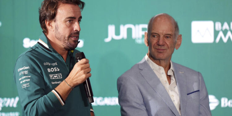 Fernando Alonso, left, speaks during a press conference to unveil Adrian Newey, right, as the newly appointed managing technical partner of Aston Martin Aramco Formula One Team, at the AMF1 Team Technology Campus, Silverstone, Northamptonshire, England, Tuesday Sept. 10, 2024. Adrian Newey said it is his goal to turn Aston Martin into Formula One world champions after he was unveiled at the British team's Silverstone headquarters. (Bradley Collyer/PA via AP)