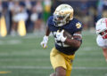 SOUTH BEND, IN - SEPTEMBER 21: Notre Dame Fighting Irish RB Devyn Ford (22) runs with the ball during a college football game between the Notre Dame Fighting Irish and Miami RedHawks on September 21, 2024 at Notre Dame Stadium in South Bend, IN (Photo by James Black/Icon Sportswire via Getty Images)