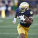 SOUTH BEND, IN - SEPTEMBER 21: Notre Dame Fighting Irish RB Devyn Ford (22) runs with the ball during a college football game between the Notre Dame Fighting Irish and Miami RedHawks on September 21, 2024 at Notre Dame Stadium in South Bend, IN (Photo by James Black/Icon Sportswire via Getty Images)