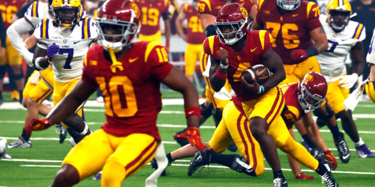 LAS VEGAS, NV - SEPTEMBER 01: Running back Woody Marks (4) of the USC Trojans runs upfield during the Modelo Vegas Kickoff Classic featuring the USC Trojans versus the LSU Tigers on September 1, 2024 at Allegiant Stadium in Las Vegas, Nevada. (Photo by Jeff Speer/Icon Sportswire via Getty Images)