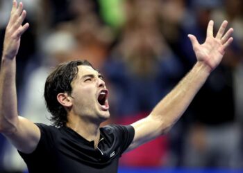 Taylor Fritz celebrates victory over Frances Tiafoe in the US Open