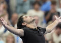 Taylor Fritz, of the United States, reacts after defeating Casper Ruud, of Norway, during the fourth round of the U.S. Open tennis championships, Sunday, Sept. 1, in New York. 2024. (AP Photo/Eduardo Munoz Alvarez)