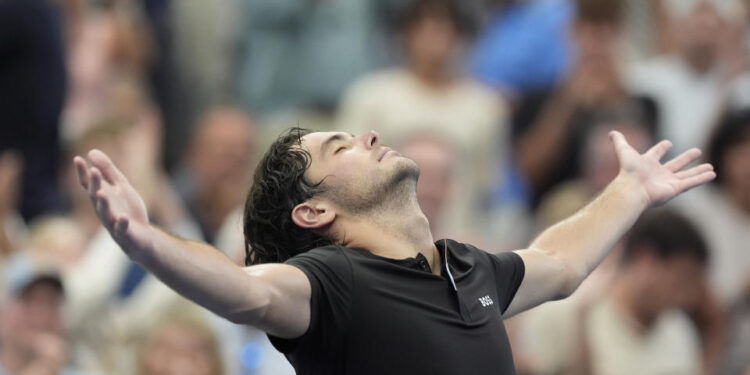 Taylor Fritz, of the United States, reacts after defeating Casper Ruud, of Norway, during the fourth round of the U.S. Open tennis championships, Sunday, Sept. 1, in New York. 2024. (AP Photo/Eduardo Munoz Alvarez)